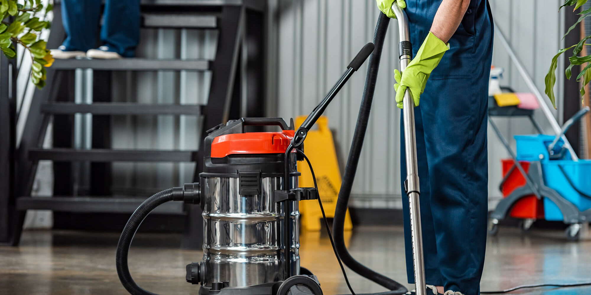 cropped-view-of-cleaner-in-uniform-cleaning-floor-2021-10-08-04-59-22-utc